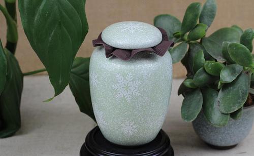本图片来自德化县鑫美陶瓷有限公司提供的茶叶罐 茶膏罐 雪花釉茶具