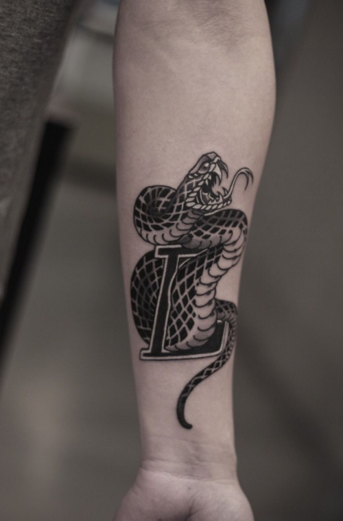 最新男女蛇纹身图片大全 个性蛇纹身图案设计(3)