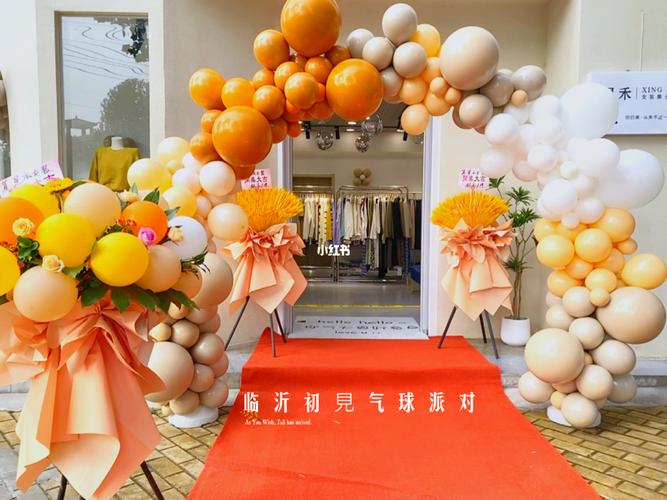 女装店开业气球拱门秋冬配色气球布置