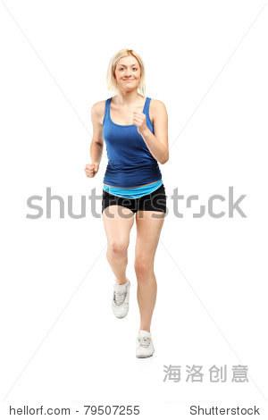 full length portrait of a female runner isolated on white back