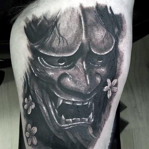 日本鬼面具纹身面容恐怖的日本鬼面具纹身图案