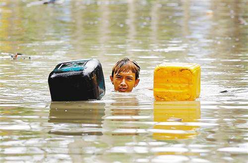 缅甸洪水致死47人(图)