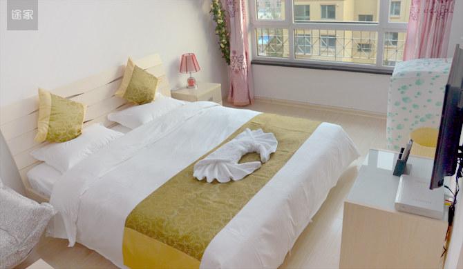 威海环翠区望海名居酒店式公寓图片:望海名居山花烂漫家庭式大床房
