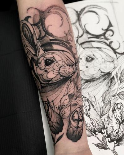 小臂黑灰甩线风兔子纹身图案