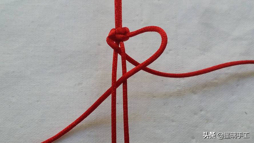 一根红绳手链编法花2分钟就能学会编1条红绳手链