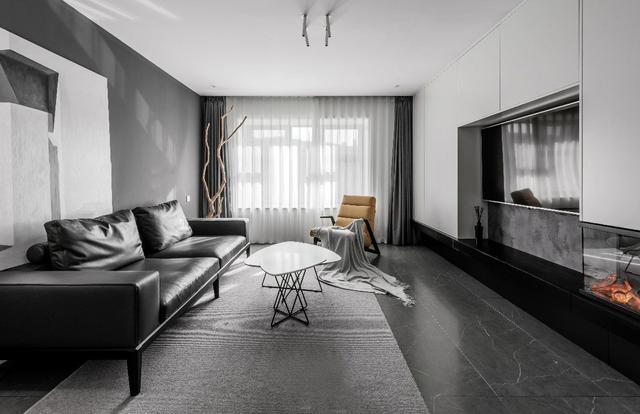 客厅空间通透简约,黑白灰各个区域过渡的和谐舒适