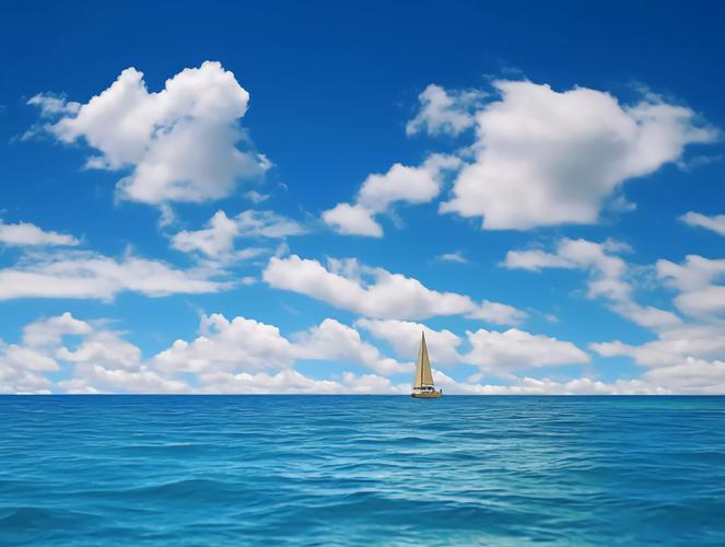 蓝天白云明亮背景大海唯美清新壁纸海面上的一艘船度假